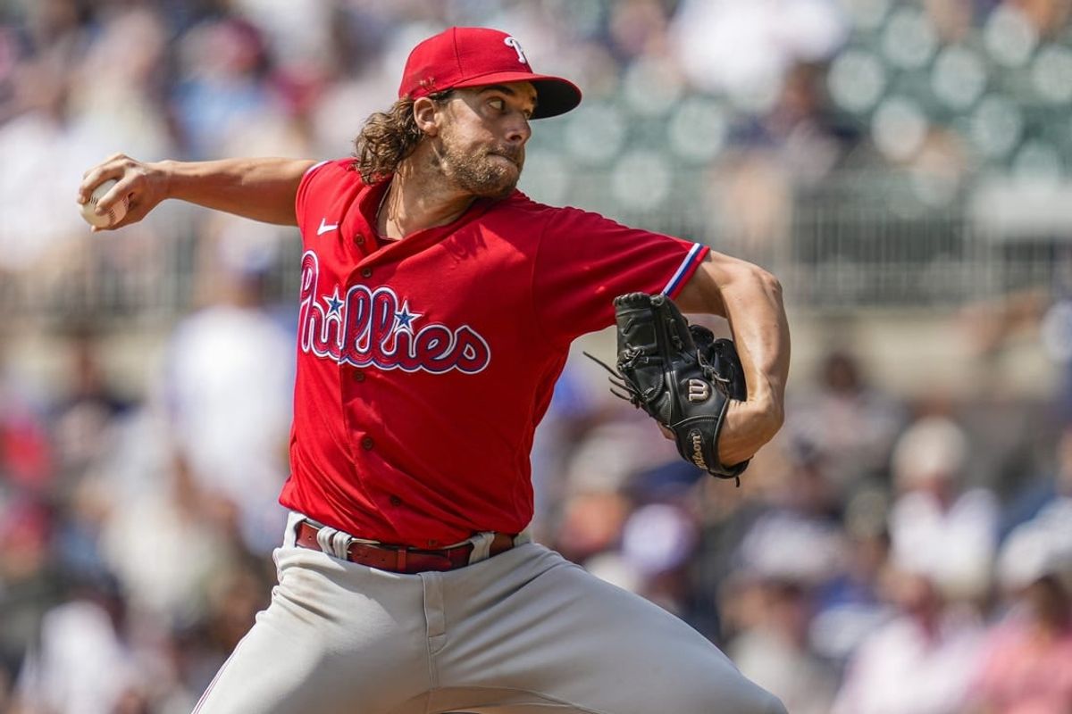 Sep 20, 2023; Cumberland, Georgia, USA; Philadelphia Phillies starting pitcher Aaron Nola (27) pitches against the Atlanta Braves during the first inning  at Truist Park.