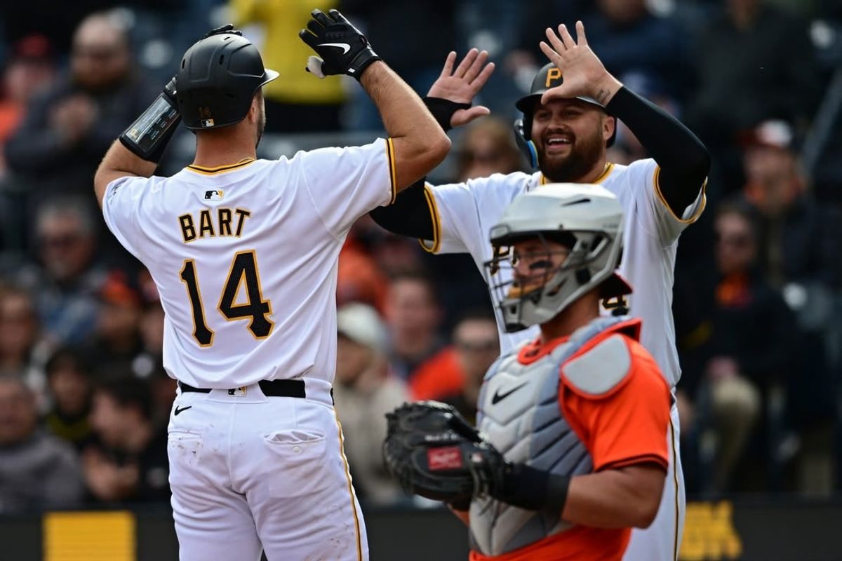 Apr 6, 2024; Pittsburgh, Pennsylvania, USA; Pittsburgh Pirates catcher Joey Bart (14) celebrates with first base Rowdy Tellez (44) after hitting a two run home run against the Baltimore Orioles during the second inning at PNC Park.