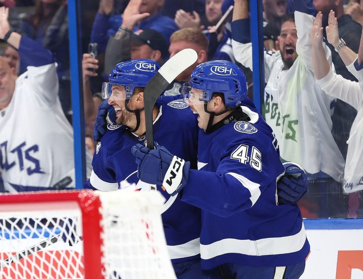 Nov 18, 2023; Tampa, Florida, USA; Tampa Bay Lightning center Luke Glendening (11) is congratulated after he scored goal against the Edmonton Oilers during the third period at Amalie Arena.