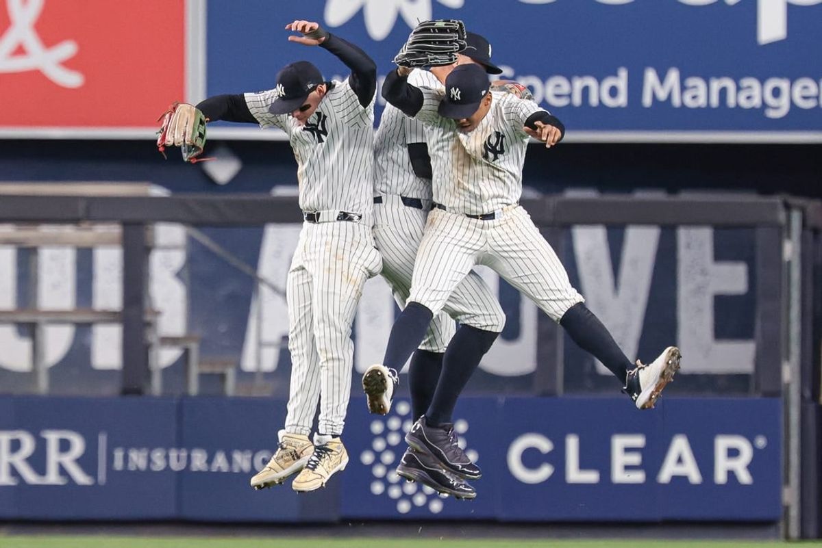 Apr 9, 2024; Bronx, New York, USA; New York Yankees left fielder Alex Verdugo (24) and center fielder Aaron Judge (99) and right fielder Juan Soto (22) celebrates after drafting the Miami Marlins at Yankee Stadium.