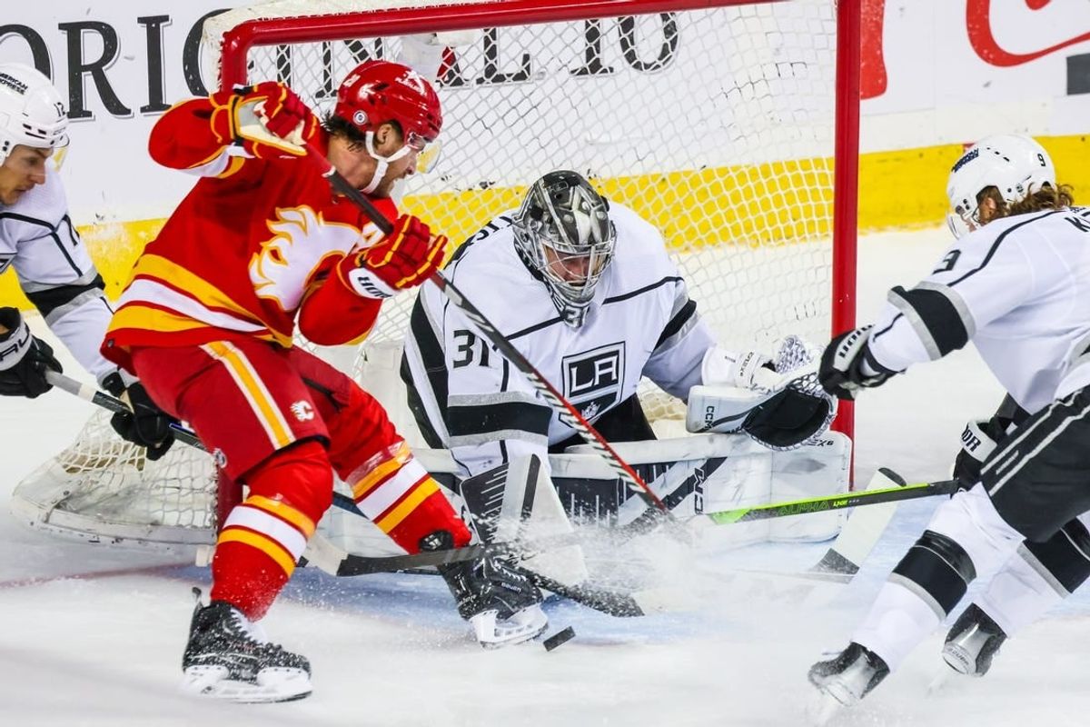 Mar 30, 2024; Calgary, Alberta, CAN; Los Angeles Kings goaltender David Rittich (31) makes a save against the Calgary Flames during the first period at Scotiabank Saddledome.
