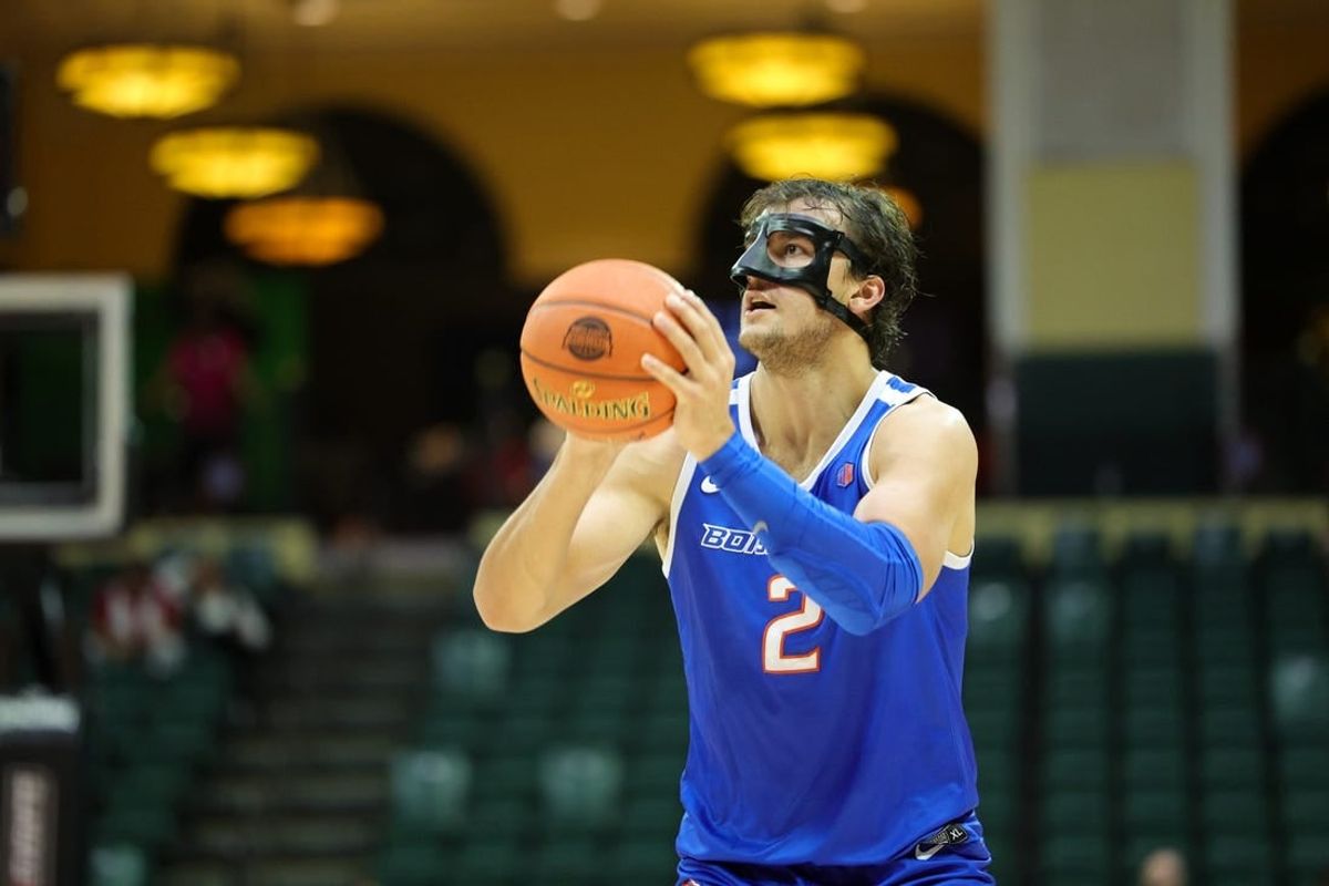 Nov 23, 2023; Kissimmee, FL, USA;  Virginia Tech Hokies guard Hunter Cattoor (0) shoots the ball  against the Virginia Tech Hokies in the first half during the ESPN Events Invitational at State Farm Field House.