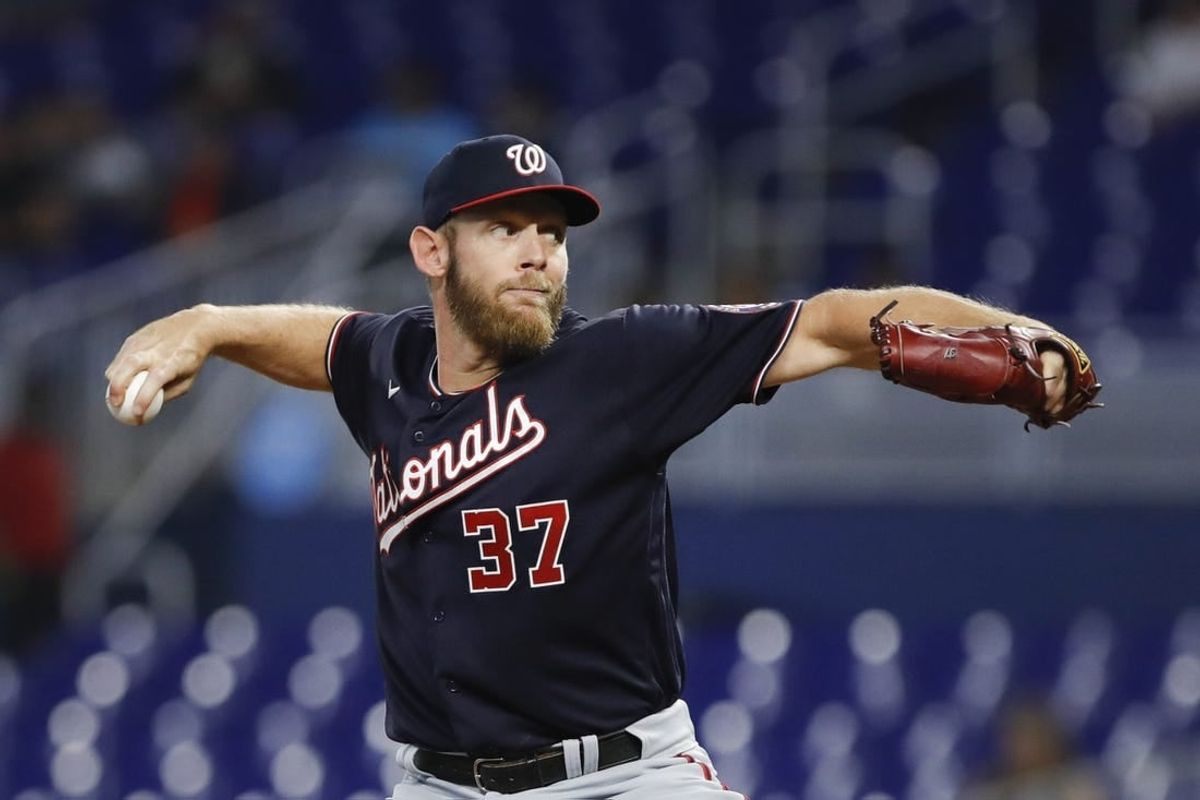 Jun 9, 2022; Miami, Florida, USA; Washington Nationals starting pitcher Stephen Strasburg (37) delivers a pitch during the first inning against the Miami Marlins at loanDepot Park.