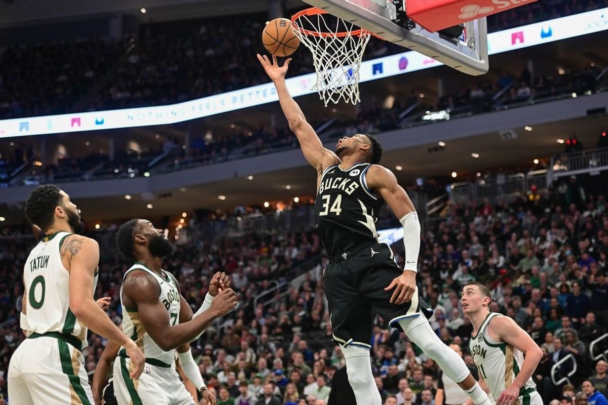 Jan 11, 2024; Milwaukee, Wisconsin, USA; Milwaukee Bucks forward Giannis Antetokounmpo (34) takes a shot in the second quarter against the Boston Celtics at Fiserv Forum.