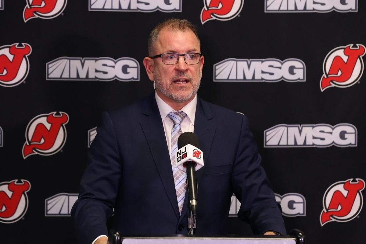 Nov 30, 2021; Newark, New Jersey, USA; New Jersey Devils executive vice president/general managerTom Fitzgerald, addresses the media about the contract extension of New Jersey Devils center Jack Hughes (86) before the start of the game against the San Jose Sharks at Prudential Center.