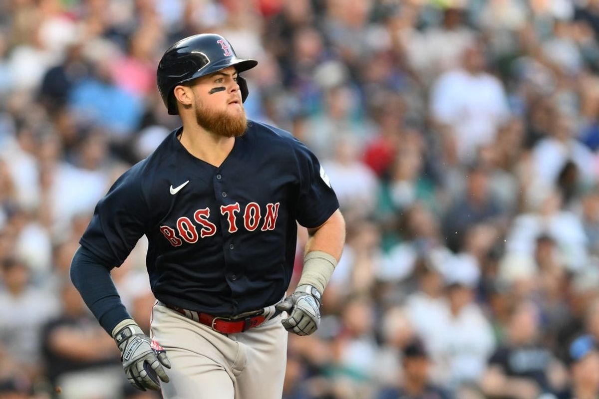 Aug 1, 2023; Seattle, Washington, USA; Boston Red Sox second baseman Christian Arroyo (39) runs toward first base after hitting a two run RBI double against the Seattle Mariners during the fourth inning at T-Mobile Park.