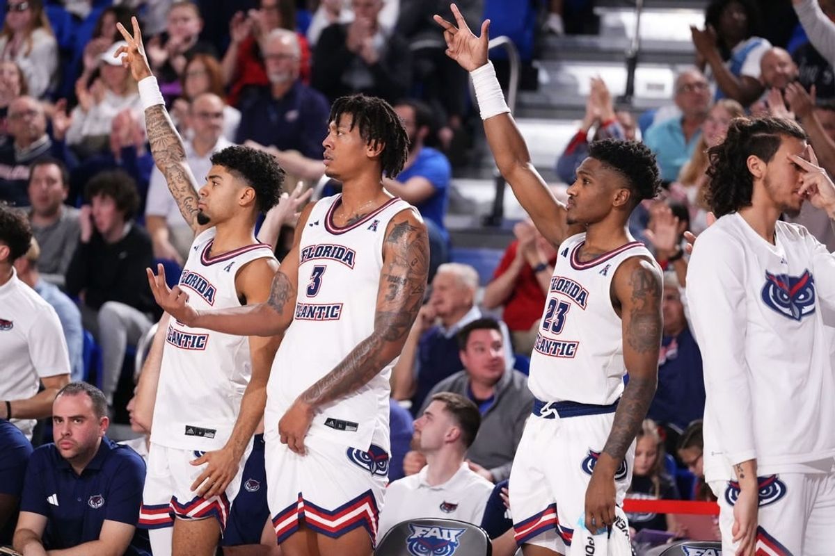 Jan 2, 2024; Boca Raton, Florida, USA; Florida Atlantic Owls players react from the sidelines after scoring against the East Carolina Pirates during the second half at Eleanor R. Baldwin Arena.