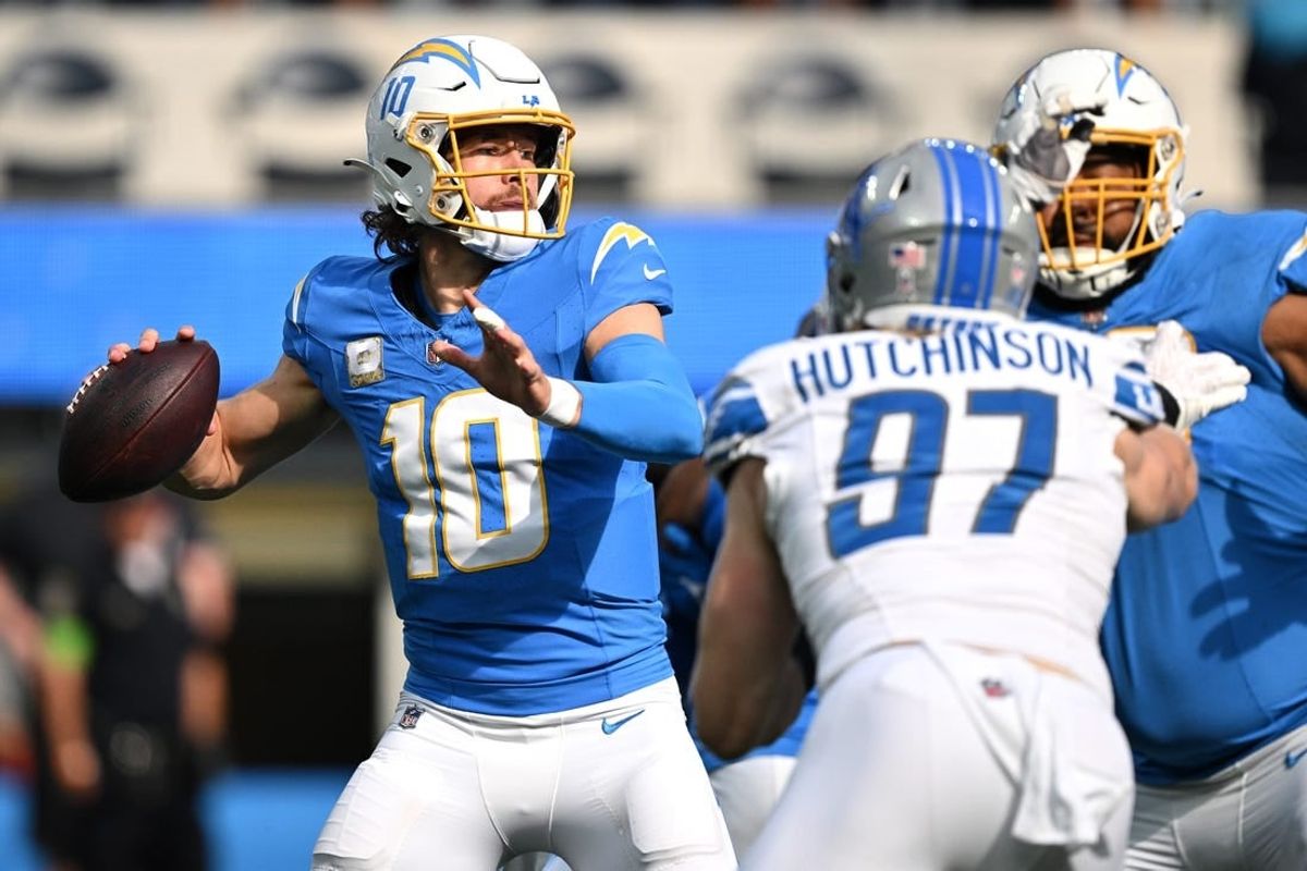 Nov 12, 2023; Inglewood, California, USA; Los Angeles Chargers quarterback Justin Herbert (10) throws a pass against the Detroit Lions during the first half at SoFi Stadium.