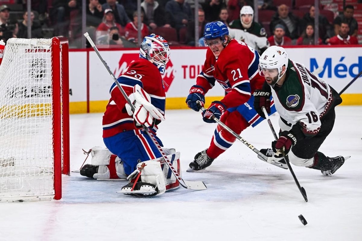 Feb 27, 2024; Montreal, Quebec, CAN; Montreal Canadiens goalie Sam Montembeault (35) makes a save against Arizona Coyotes left wing Jason Zucker (16) during the first period at Bell Centre.