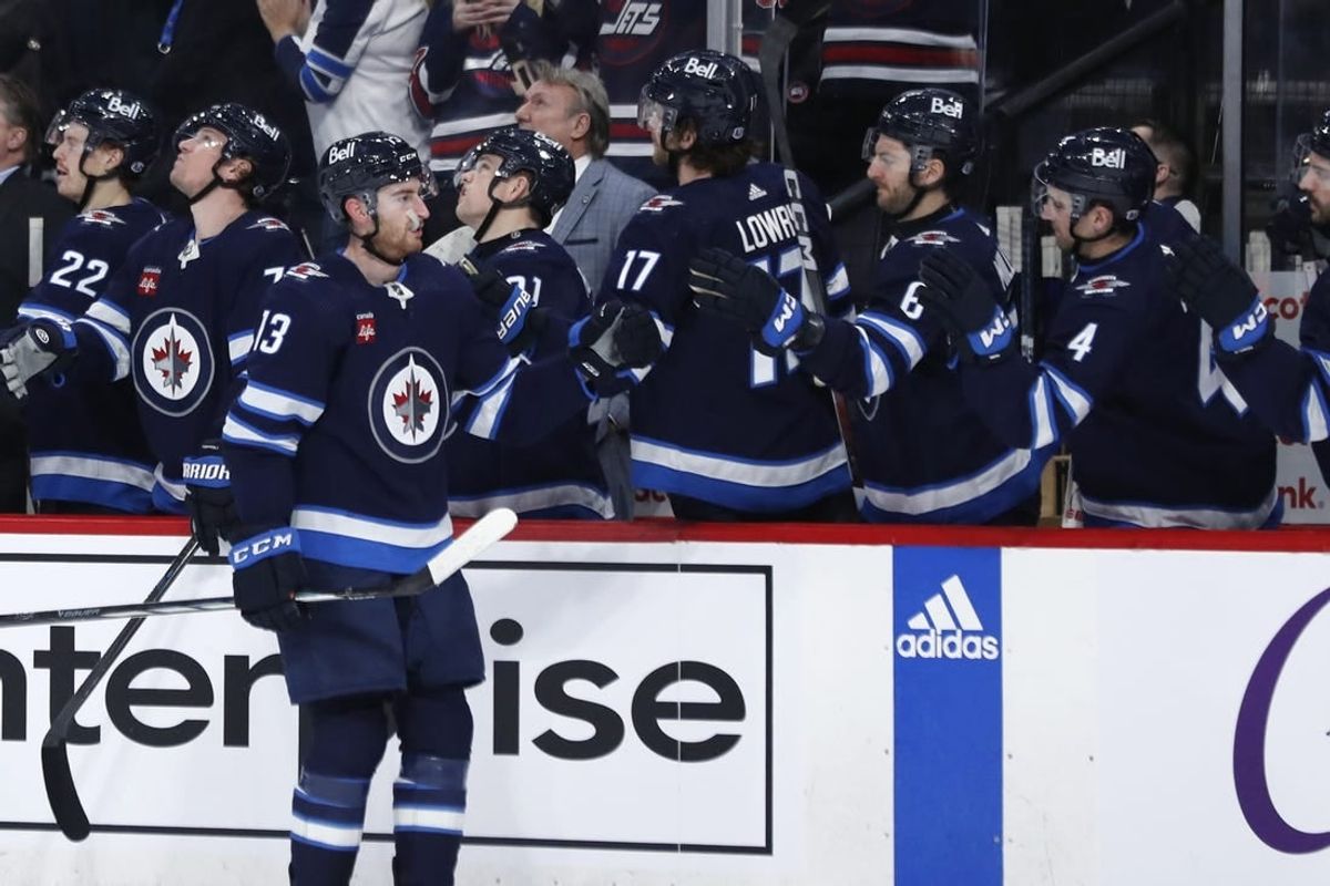 Apr 4, 2024; Winnipeg, Manitoba, CAN; Winnipeg Jets center Gabriel Vilardi (13) celebrates his first period goal against the Calgary Flames at Canada Life Centre.