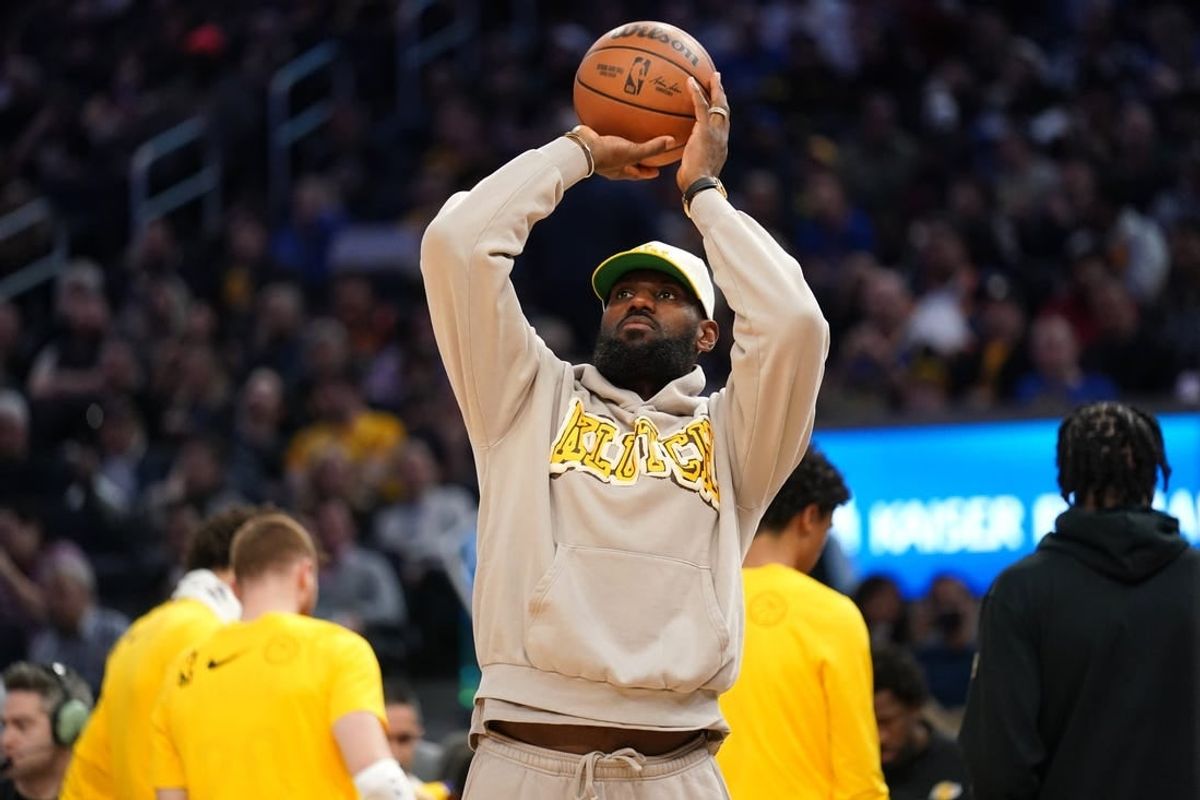 Feb 22, 2024; San Francisco, California, USA; Los Angeles Lakers forward Lebron James (23) shoots the ball during a timeout against the Golden State Warriors in the third quarter at the Chase Center.