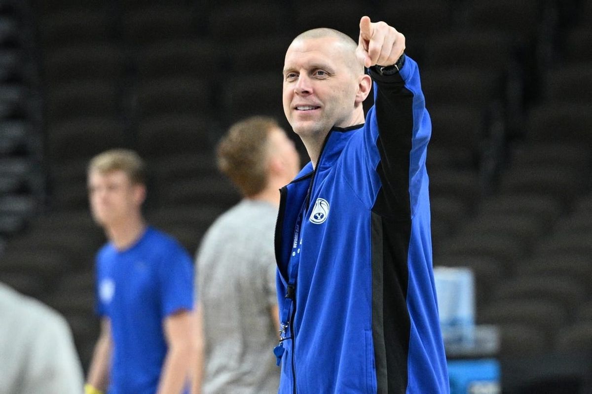 Mar 20, 2024; Omaha, NE, USA;  Brigham Young Cougars head coach Mark Pope watches the team during the NCAA first round practice session at CHI Health Center Omaha.