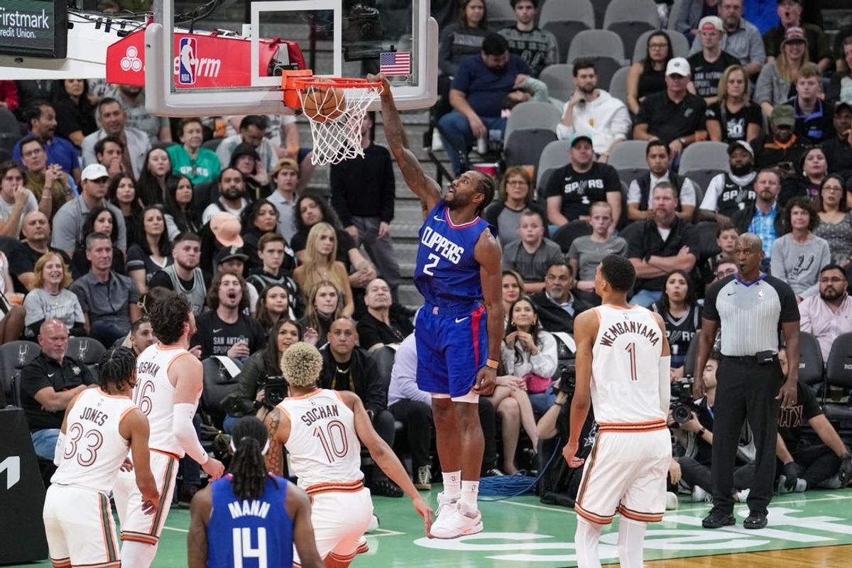 Nov 20, 2023; San Antonio, Texas, USA;  LA Clippers forward Kawhi Leonard (2) dunks in the first half against the San Antonio Spurs at the Frost Bank Center.