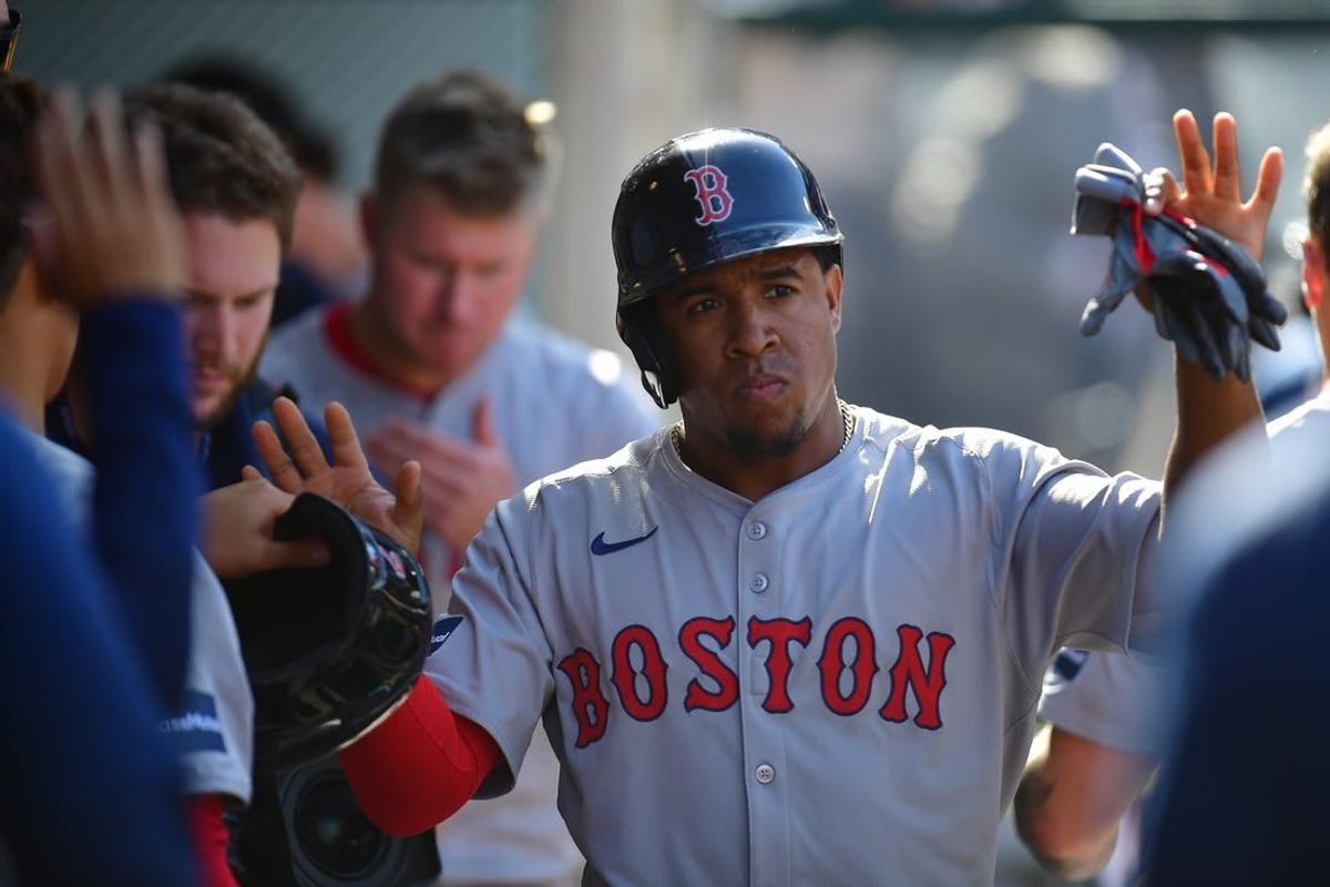 Apr 7, 2024; Anaheim, California, USA; Boston Red Sox outfielder Ceddanne Rafaela (43) is greeted after scoring a run against the Los Angeles Angels during the ninth inning at Angel Stadium.
