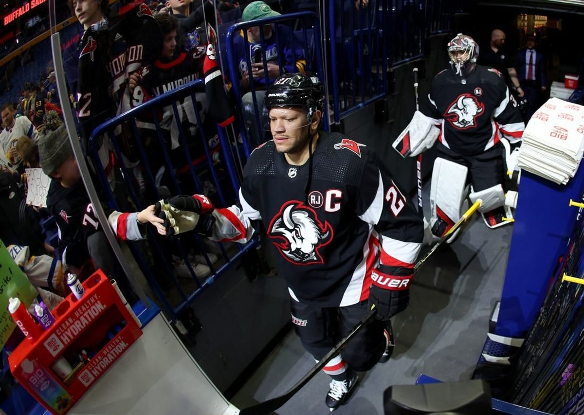 Mar 3, 2024; Buffalo, New York, USA;  Buffalo Sabres right wing Kyle Okposo (21) makes his way to the ice before a game against the Winnipeg Jets at KeyBank Center.