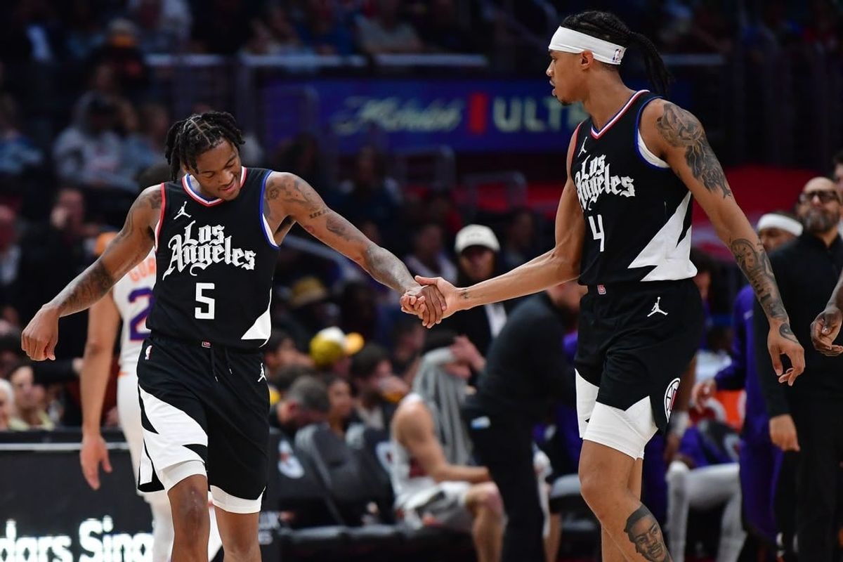 Apr 10, 2024; Los Angeles, California, USA; Los Angeles Clippers guard Bones Hyland (5) celebrates with guard Brandon Boston Jr. (4) after scoring a basket against the Phoenix Suns during the second half at Crypto.com Arena.