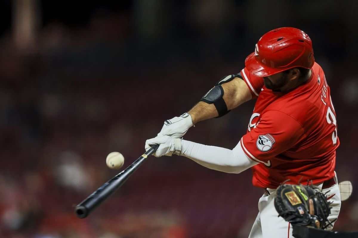 May 8, 2024; Cincinnati, Ohio, USA; Cincinnati Reds pinch hitter Mike Ford (38) bats in the ninth inning against the Arizona Diamondbacks at Great American Ball Park.