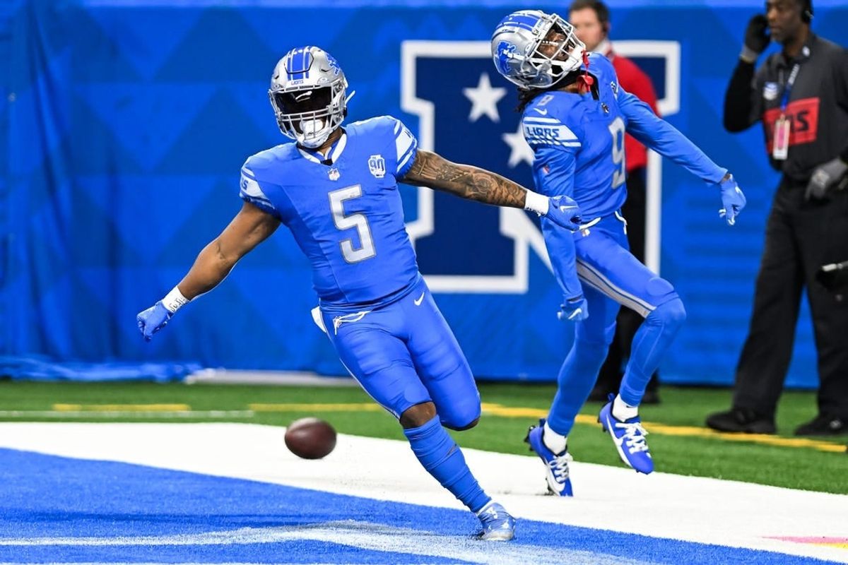 Oct 8, 2023; Detroit, Michigan, USA; Detroit Lions running back David Montgomery (5) celebrates in the end zone with wide receiver Jameson Williams (9) after running for a touchdown against the Carolina Panthers in the first quarter at Ford Field.