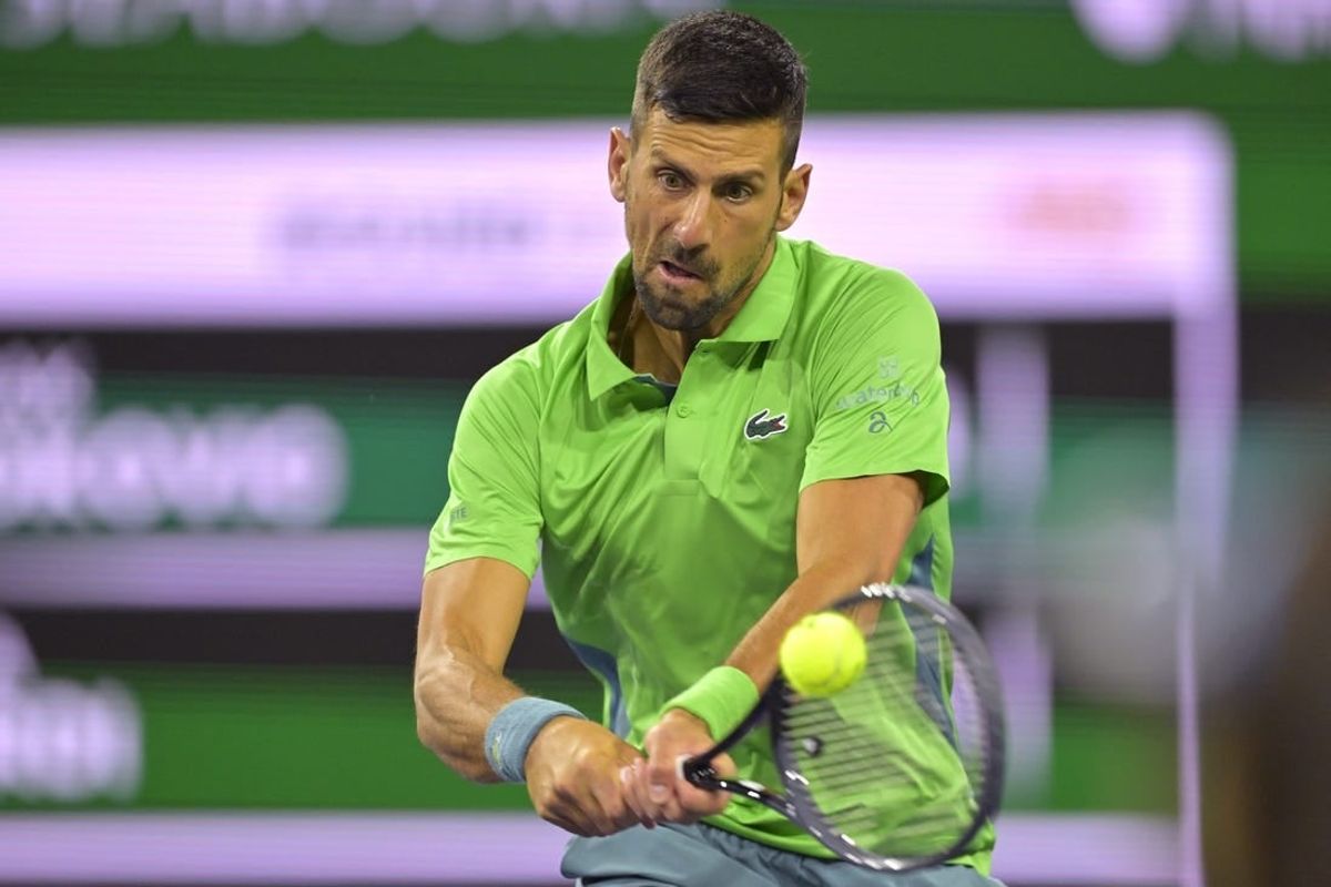 Mar 11, 2024; Indian Wells, CA, USA;  Novak Djokovic (SRB) hits a shot in his third round match against Luca Nardi (ITA) in the BNP Paribas Open at the Indian Wells Tennis Garden.