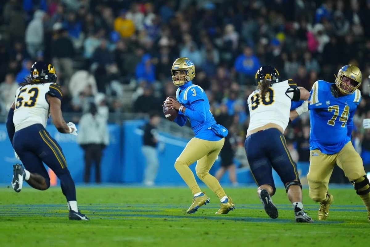 Nov 25, 2023; Pasadena, California, USA; UCLA Bruins quarterback Dante Moore (3) throws the ball against the California Golden Bears in the first half at Rose Bowl.