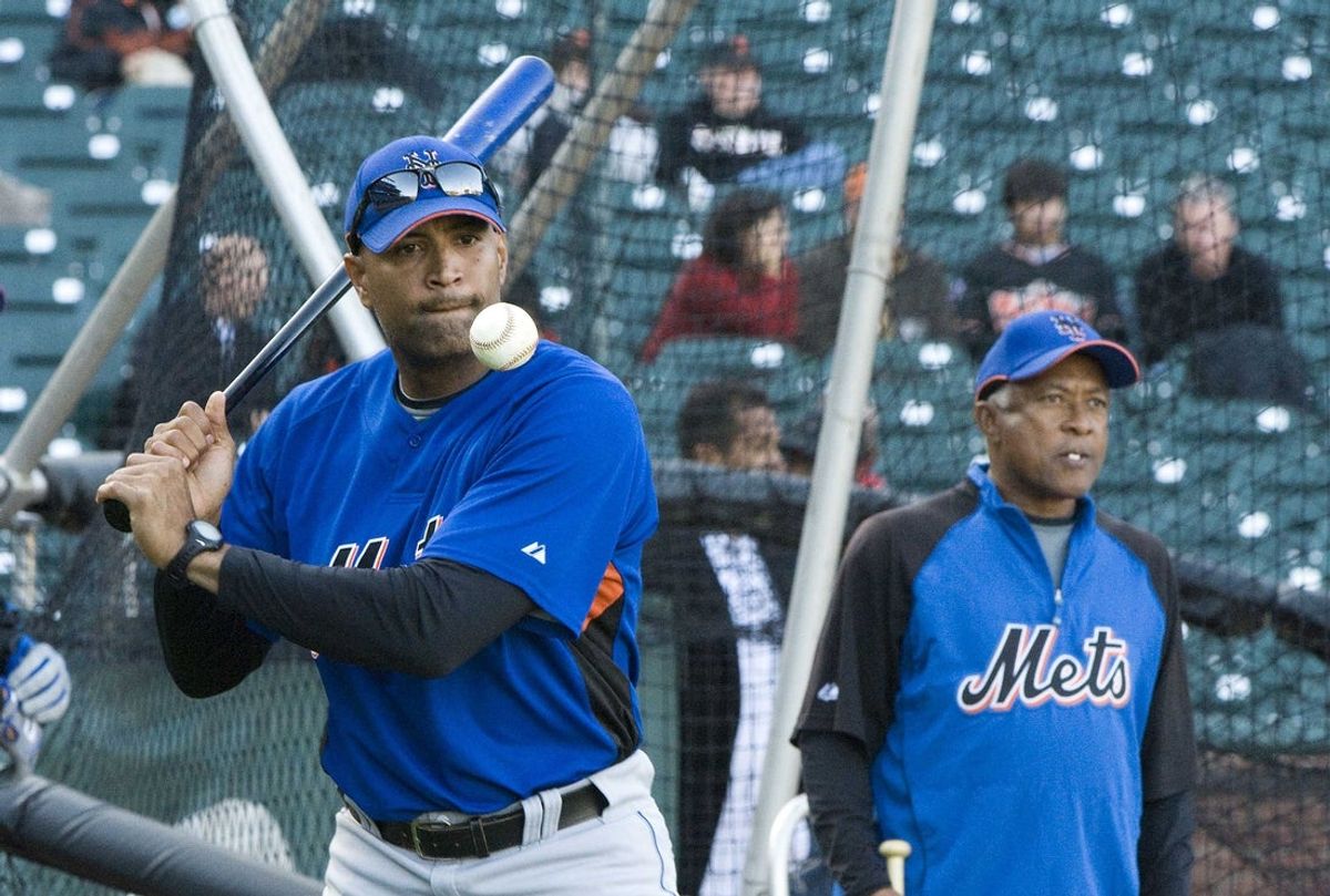 May 15, 2009; San Francisco, CA, USA; New York Mets catching instructor Sandy Alomar Jr. (left) and bench coach Sandy Alomar Sr. (right) perform infield drills before the game against the San Francisco Giants at AT&T Park in San Francisco, CA. The Mets defeated the Giants 8-6. Mandatory Credit: Kyle Terada-Imagn Images