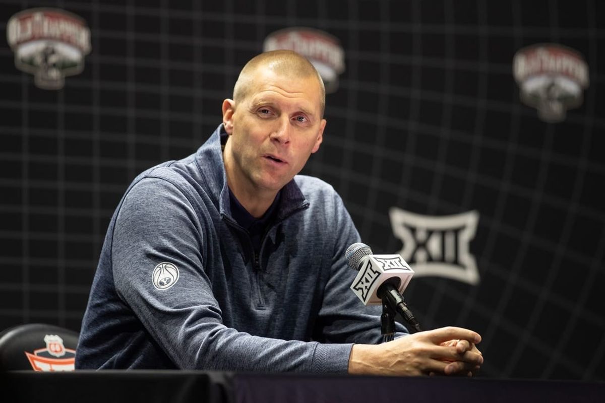 Oct 18, Kansas City, MO, USA; Brigham Young University head coach Mark Pope answers questions at the Big 12 Men s Basketball Tipoff at T-Mobile Center.