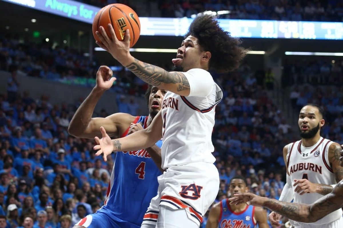 Feb 3, 2024; Oxford, Mississippi, USA; Auburn Tigers guard Tre Donaldson (3) drives to the basket during the first half against the Mississippi Rebels at The Sandy and John Black Pavilion at Ole Miss.