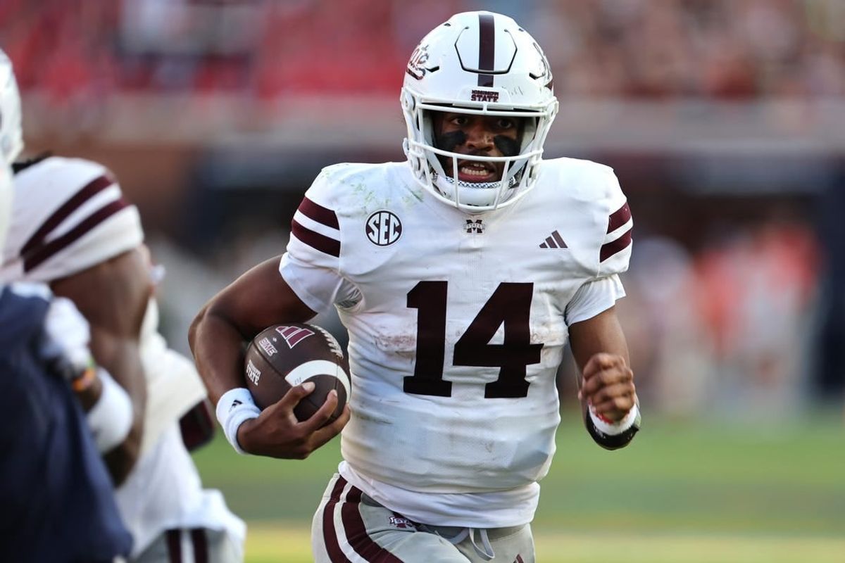 Oct 28, 2023; Auburn, Alabama, USA;  Mississippi State Bulldogs quarterback Mike Wright (14) carries against the Auburn Tigers during the third quarter at Jordan-Hare Stadium.