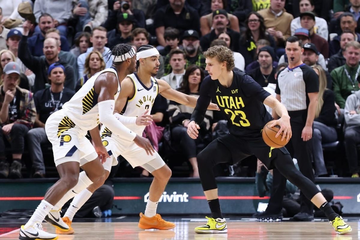 Jan 15, 2024; Salt Lake City, Utah, USA; Utah Jazz forward Lauri Markkanen (23) looks to drive against Indiana Pacers guard Buddy Hield (7) and guard Andrew Nembhard (2) during the second quarter at Delta Center.