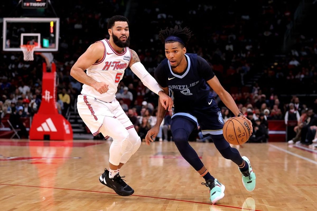 Nov 22, 2023; Houston, Texas, USA; Memphis Grizzlies forward Ziaire Williams (8) handles the ball against Houston Rockets guard Fred VanVleet (5) during the first quarter at Toyota Center.