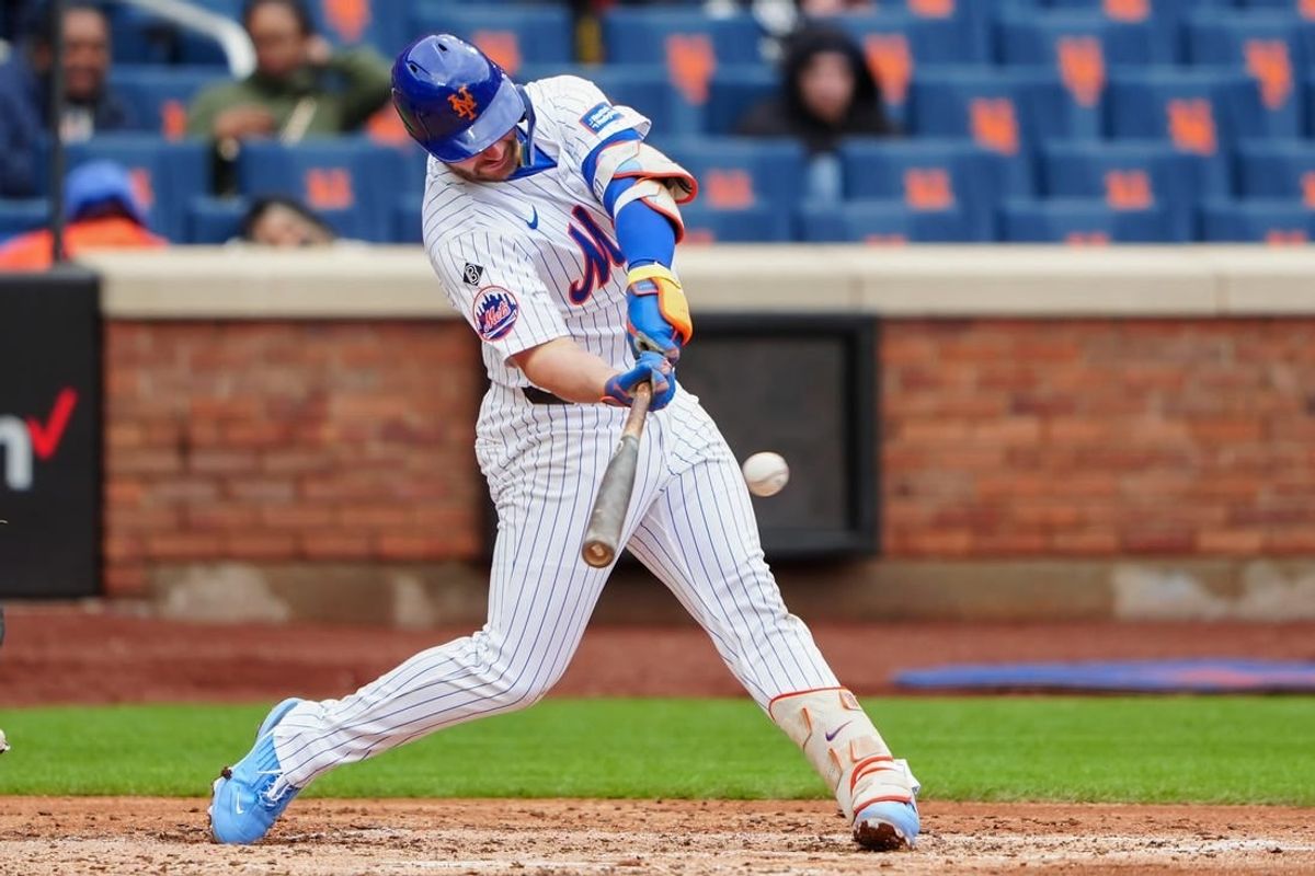 Apr 4, 2024; New York City, New York, USA; New York Mets first baseman Pete Alonso (20) hits a single against the Detroit Tigers during the fifth inning at Citi Field.