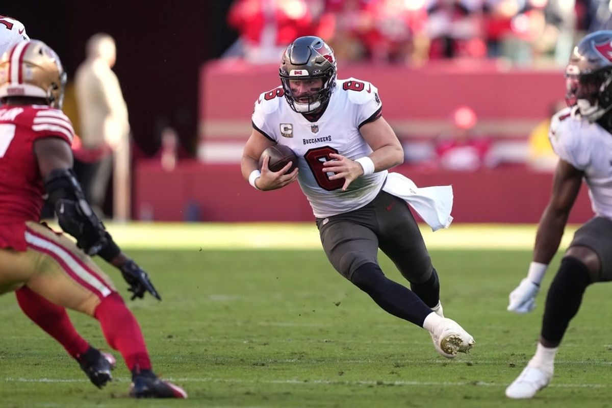 Nov 19, 2023; Santa Clara, California, USA; Tampa Bay Buccaneers quarterback Baker Mayfield (6) carries the ball against the San Francisco 49ers during the second quarter at Levi's Stadium.