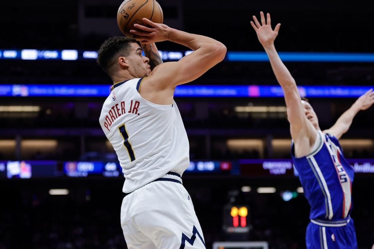 Dec 2, 2023; Sacramento, California, USA; Denver Nuggets forward Michael Porter Jr. (1) shoots the ball against Sacramento Kings guard Kevin Huerter (9) during the second quarter at Golden 1 Center.