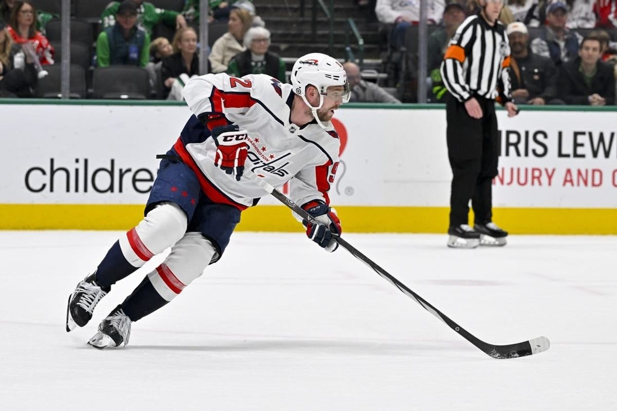 Jan 27, 2024; Dallas, Texas, USA; Washington Capitals center Evgeny Kuznetsov (92) skates against the Dallas Stars during the second period at the American Airlines Center.