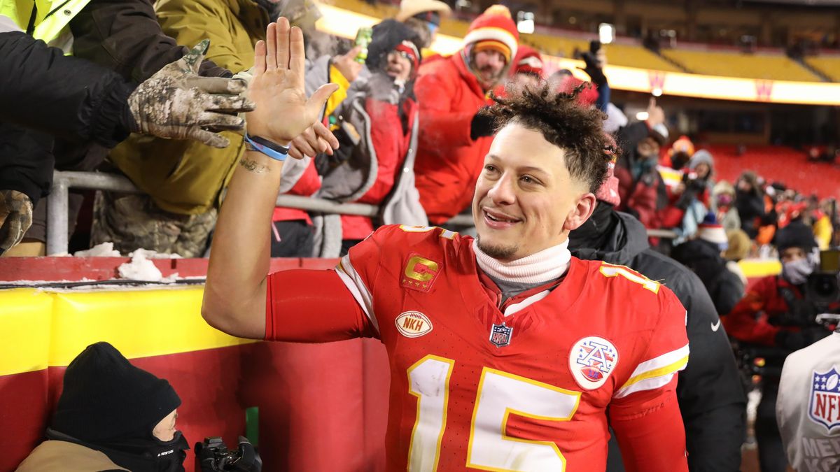 Quarterback Patrick Mahomes high fives fans after an AFC Wild Card playoff game between the Miami Dolphins and Kansas City Chiefs.
