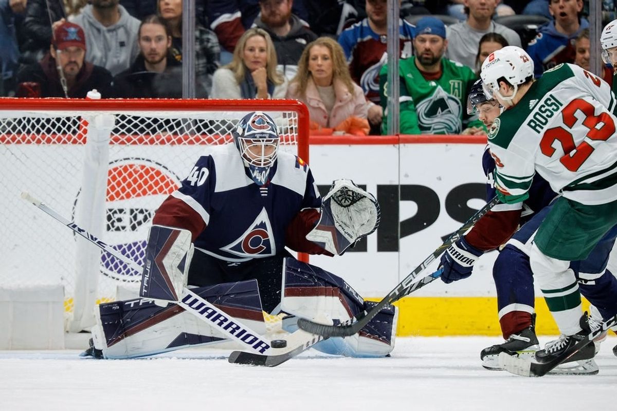 Mar 8, 2024; Denver, Colorado, USA; Minnesota Wild center Marco Rossi (23) attempts a shot against Colorado Avalanche goaltender Alexandar Georgiev (40) in the second period at Ball Arena.