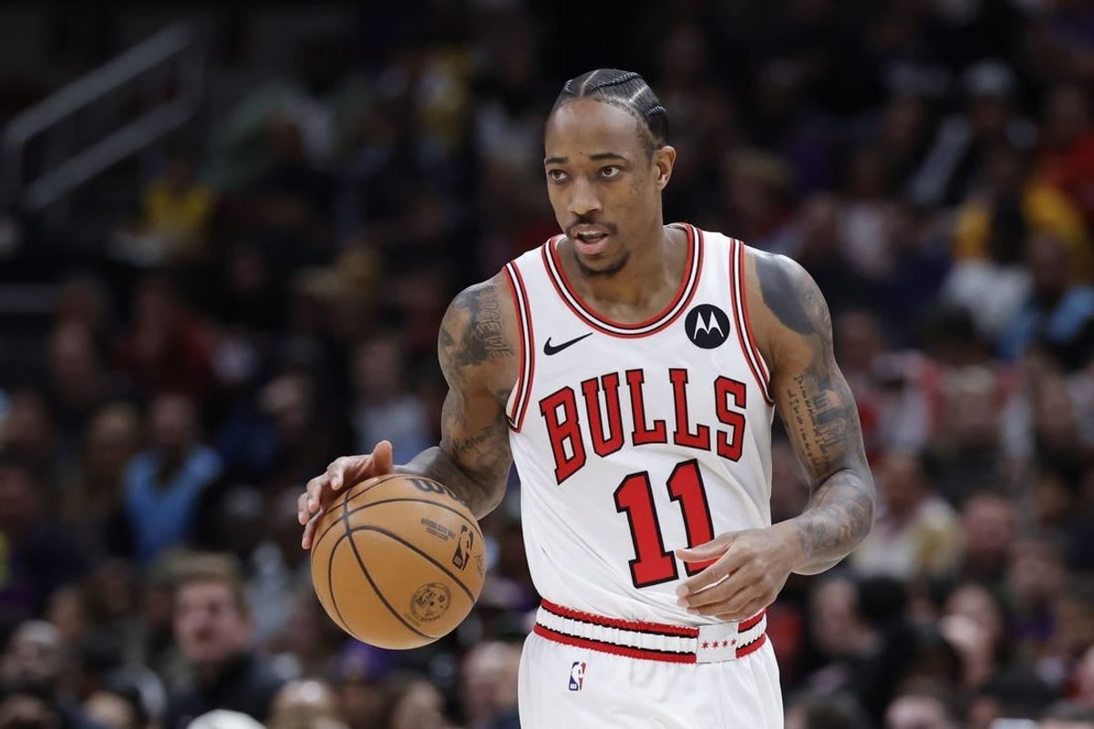 Dec 20, 2023; Chicago, Illinois, USA; Chicago Bulls forward DeMar DeRozan (11) brings the ball up court against the Los Angeles Lakers during the first half at United Center.
