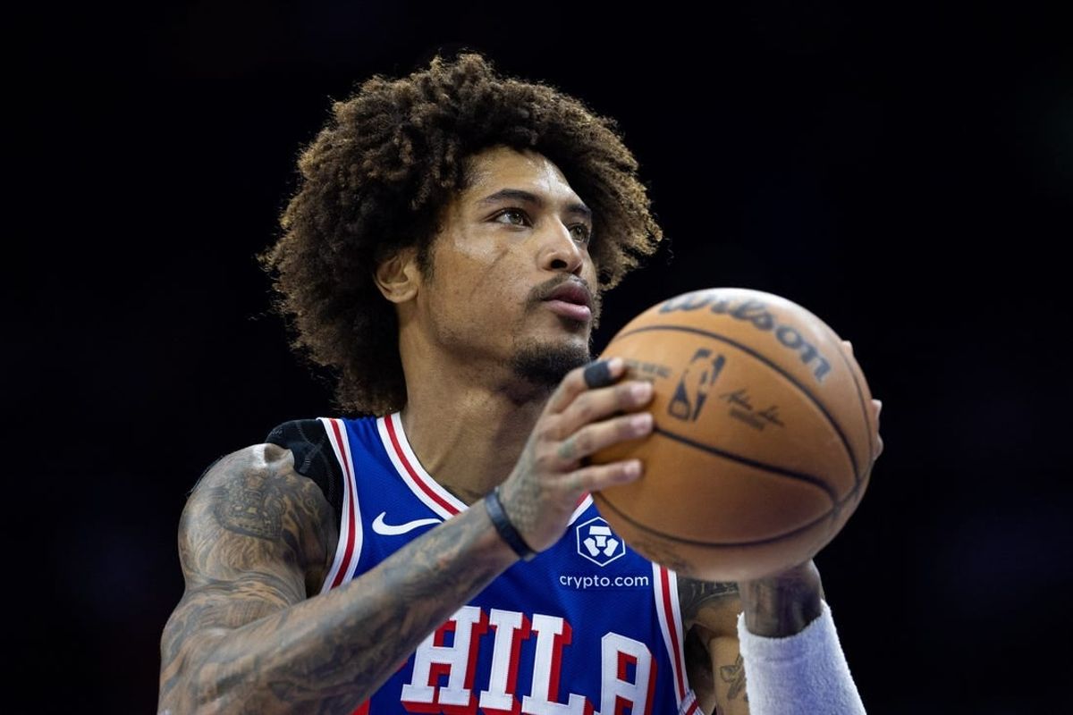Mar 6, 2024; Philadelphia, Pennsylvania, USA; Philadelphia 76ers guard Kelly Oubre Jr. (9) shoots a foul shot against the Memphis Grizzlies during the second quarter at Wells Fargo Center.
