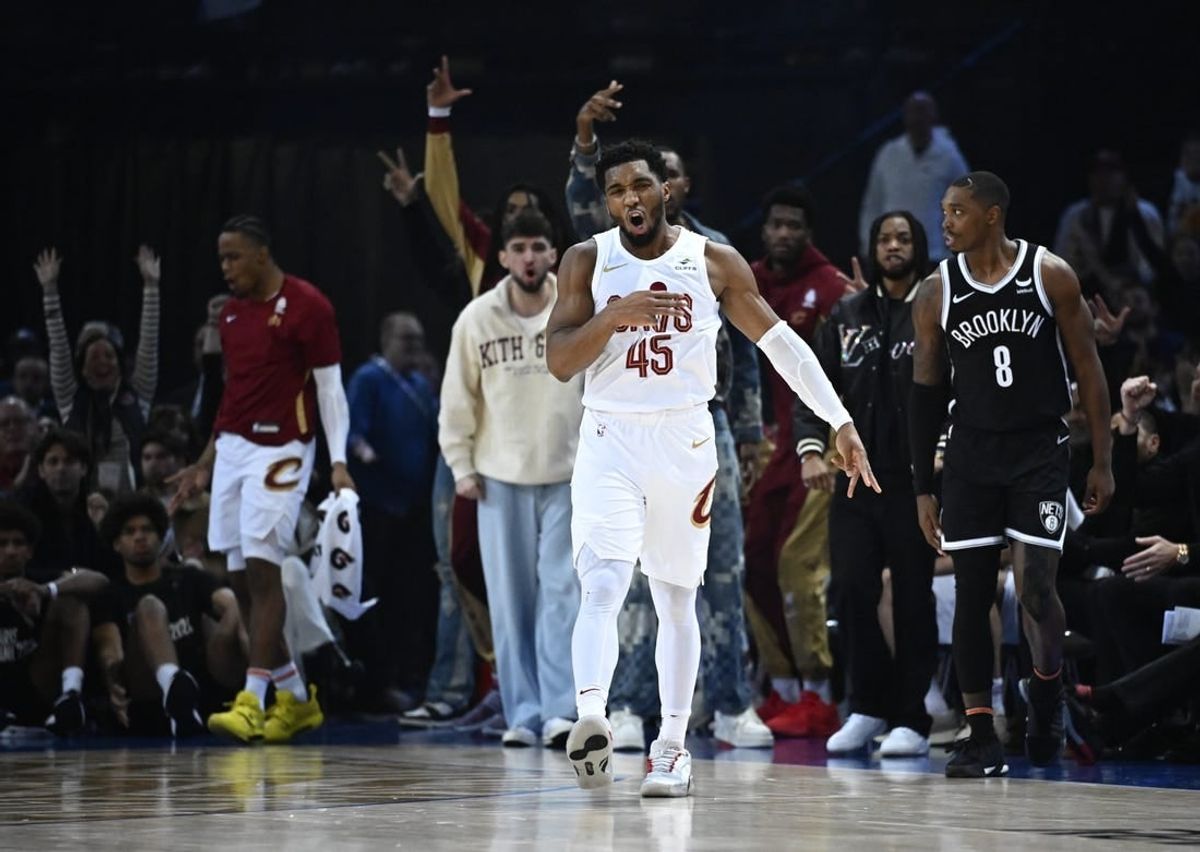 Jan 11, 2024; Paris, FRANCE; Cleveland Cavaliers guard Donovan Mitchell (45) celebrates a three pointer against the Brooklyn Nets in the NBA Paris Game at AccorHotels Arena.
