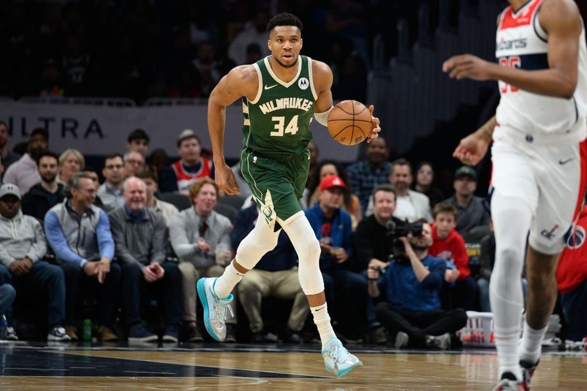 Apr 2, 2024; Washington, District of Columbia, USA; Milwaukee Bucks forward Giannis Antetokounmpo (34) brings the ball up court during the first quarter at Capital One Arena.