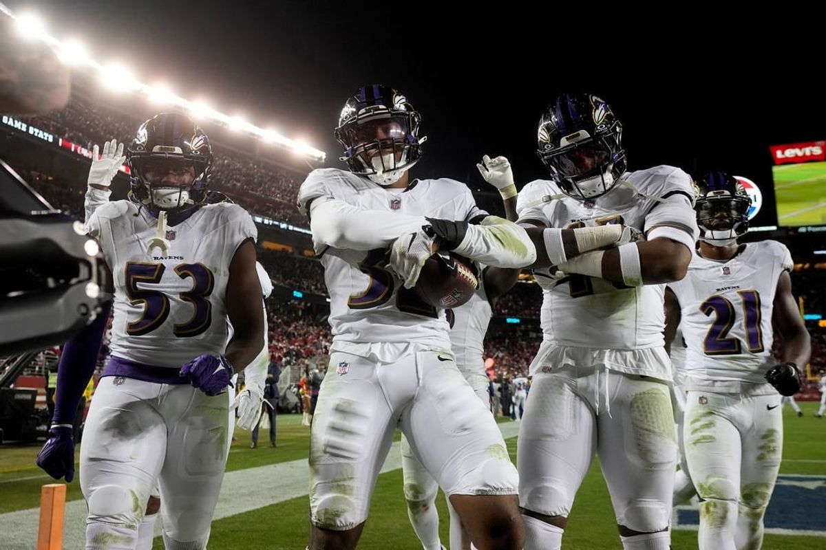 Dec 25, 2023; Santa Clara, California, USA; Baltimore Ravens linebacker Del'Shawn Phillips (53), safety Marcus Williams (32), and cornerback Daryl Worley (41) celebrate in the end zone after Williams intercepted a pass against the San Francisco 49ers in the fourth quarter at Levi's Stadium.
