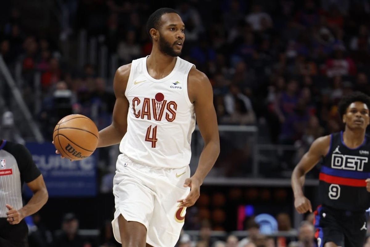 Mar 1, 2024; Detroit, Michigan, USA;  Cleveland Cavaliers forward Evan Mobley (4) dribbles in the first half against the Detroit Pistons at Little Caesars Arena.