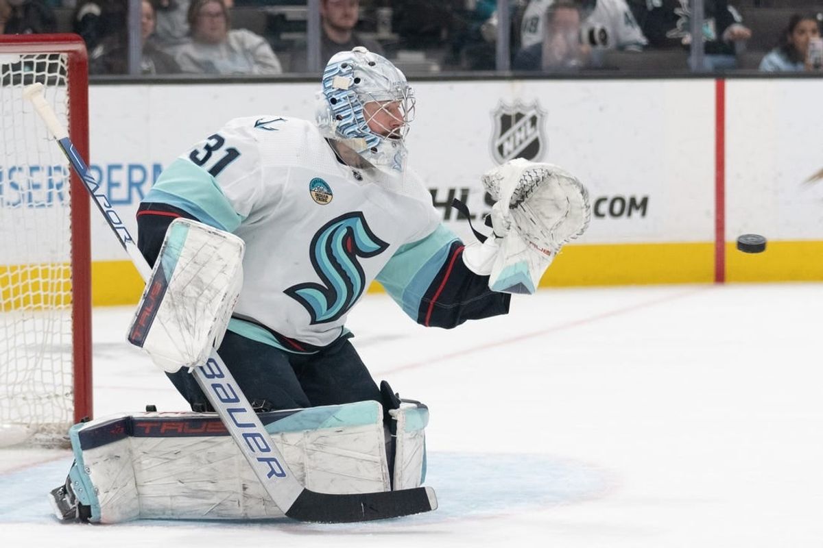 Apr 1, 2024; San Jose, California, USA; Seattle Kraken goaltender Philipp Grubauer (31) prepares to catch the puck during the second period against the San Jose Sharks at SAP Center at San Jose.