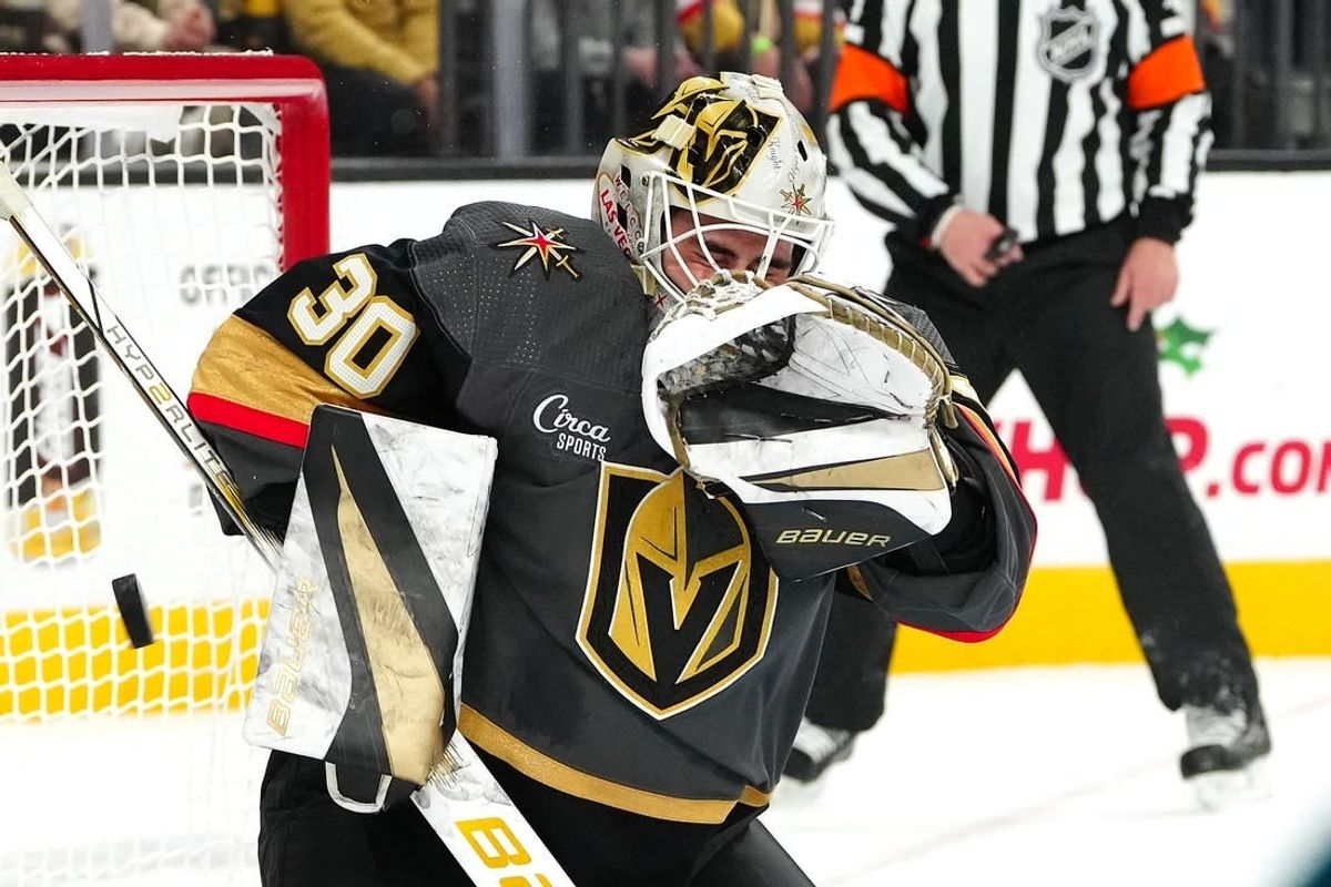 Dec 10, 2023; Las Vegas, Nevada, USA; Vegas Golden Knights goaltender Jiri Patera (30) makes a save against the San Jose Sharks during the first period at T-Mobile Arena.
