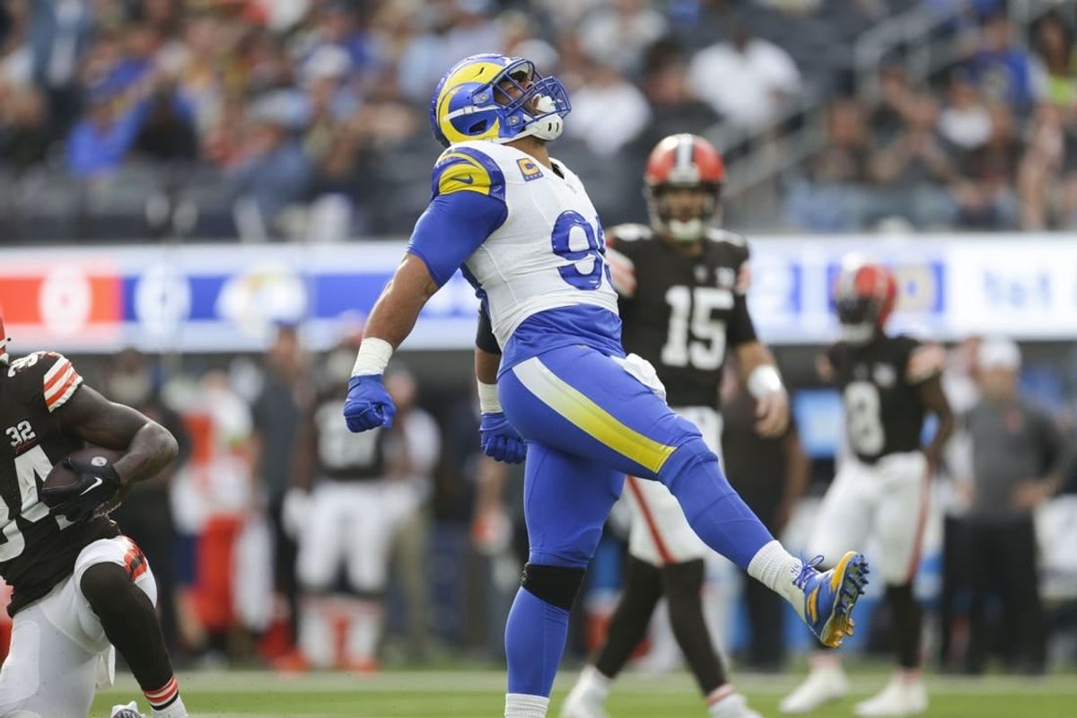 Dec 3, 2023; Inglewood, California, USA; Los Angeles Rams defesnive tackle Aaron Donald (99) celebrates in the first half in a game against the Cleveland Browns at SoFi Stadium.