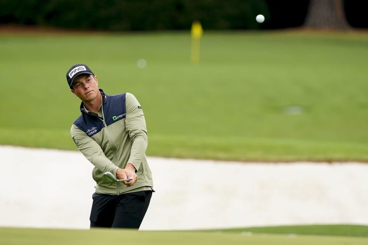Apr 9, 2024; Augusta, Georgia, USA; Viktor Hovland hits balls at the practice facility during a practice round for the Masters Tournament golf tournament at Augusta National Golf Club.