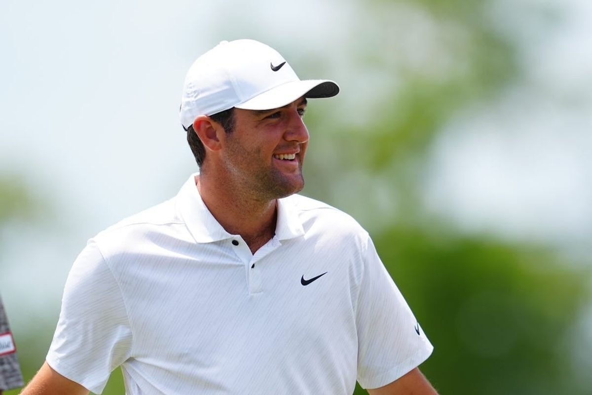 Apr 22, 2022; Avondale, Louisiana, USA; Scottie Scheffler smiles on the ninth hole green during the second round of the Zurich Classic of New Orleans golf tournament.
