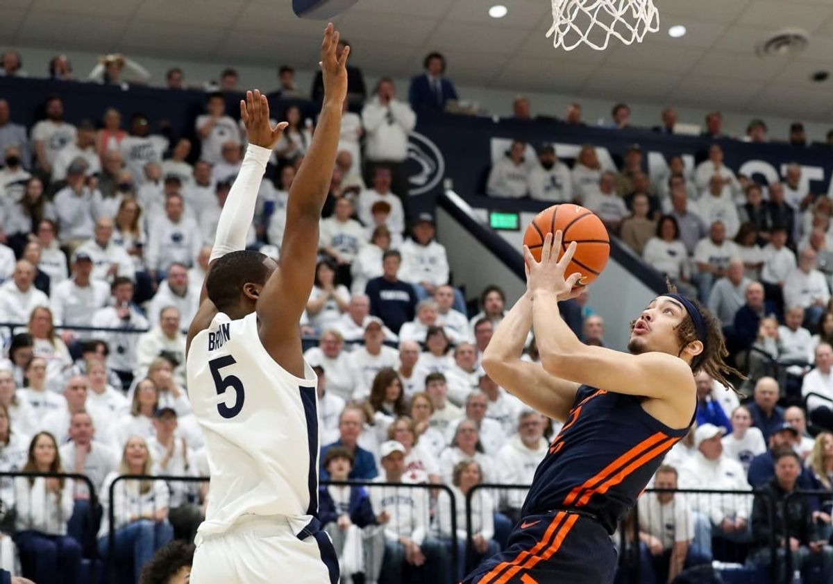 Feb 21, 2024; University Park, Pennsylvania, USA; Illinois Fighting Illini guard Dra Gibbs-Lawhorn (2) drives against Penn State Nittany Lions guard Jameel Brown (5) during the first half at Rec Hall.