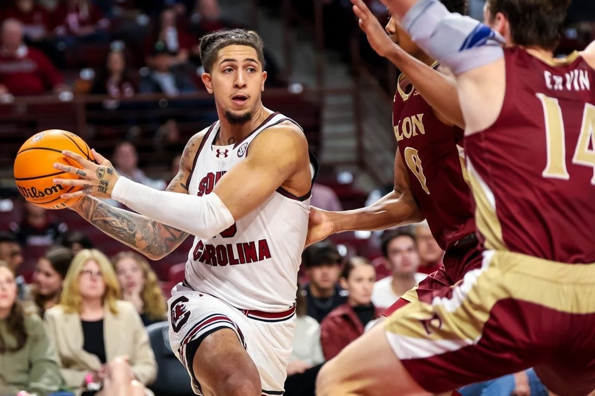 Dec 22, 2023; Columbia, South Carolina, USA; South Carolina Gamecocks guard Myles Stute (10) looks to pass against the Elon Phoenix in the first half at Colonial Life Arena.