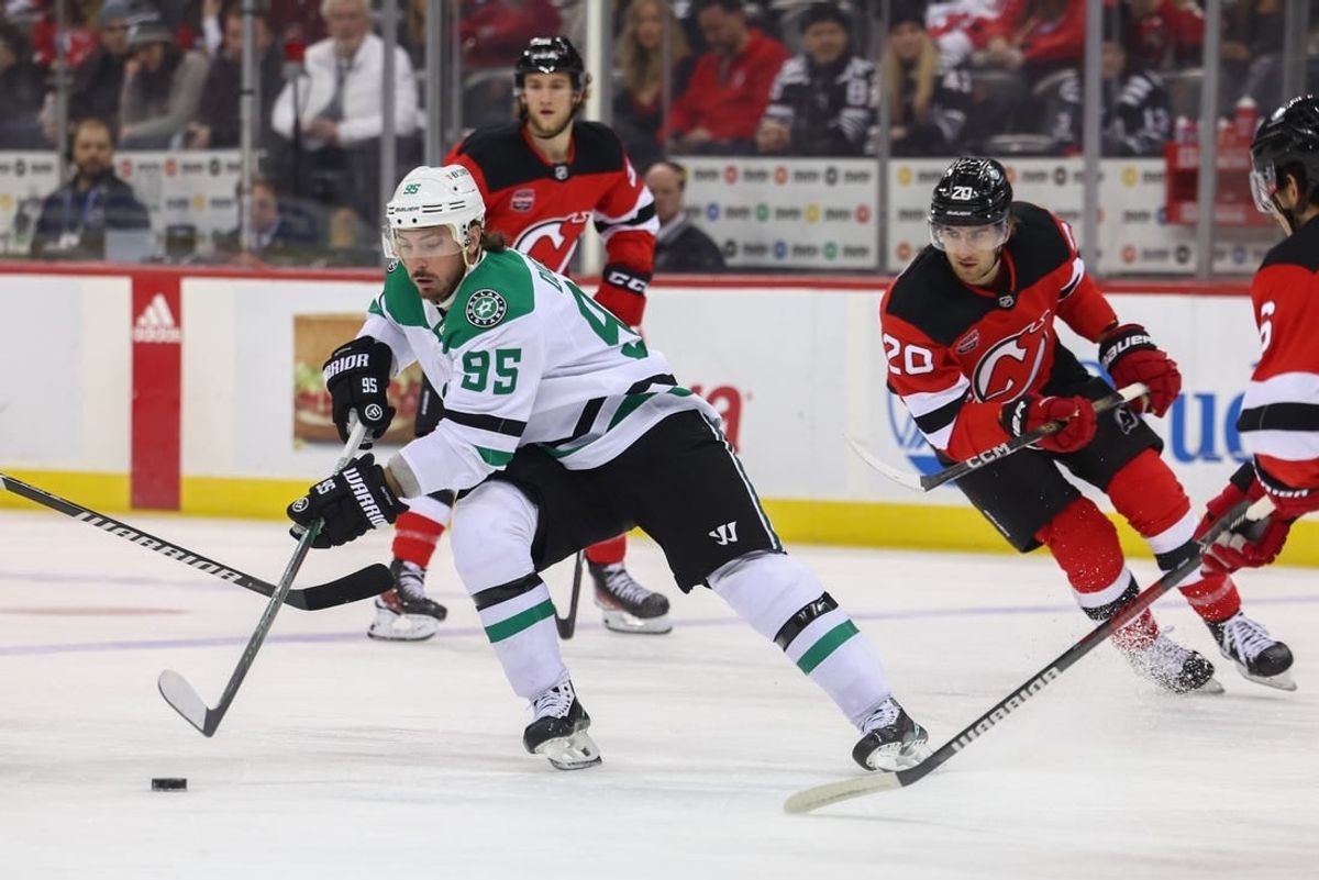 Jan 20, 2024; Newark, New Jersey, USA; Dallas Stars center Matt Duchene (95) skates with the puck against the New Jersey Devils during the first period at Prudential Center.